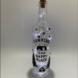 Light up glass bottle with camping design